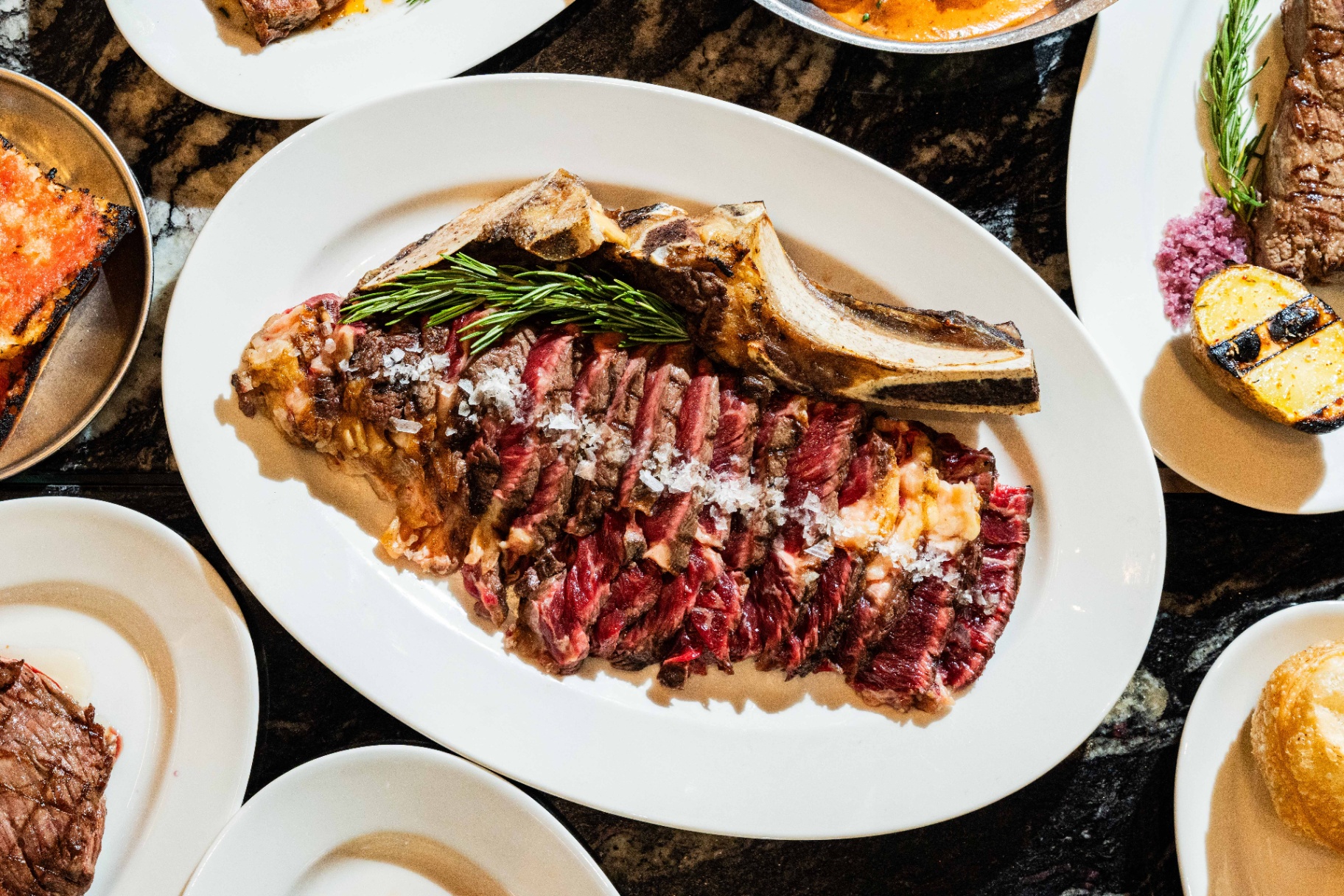 Ribeye served on a marble table